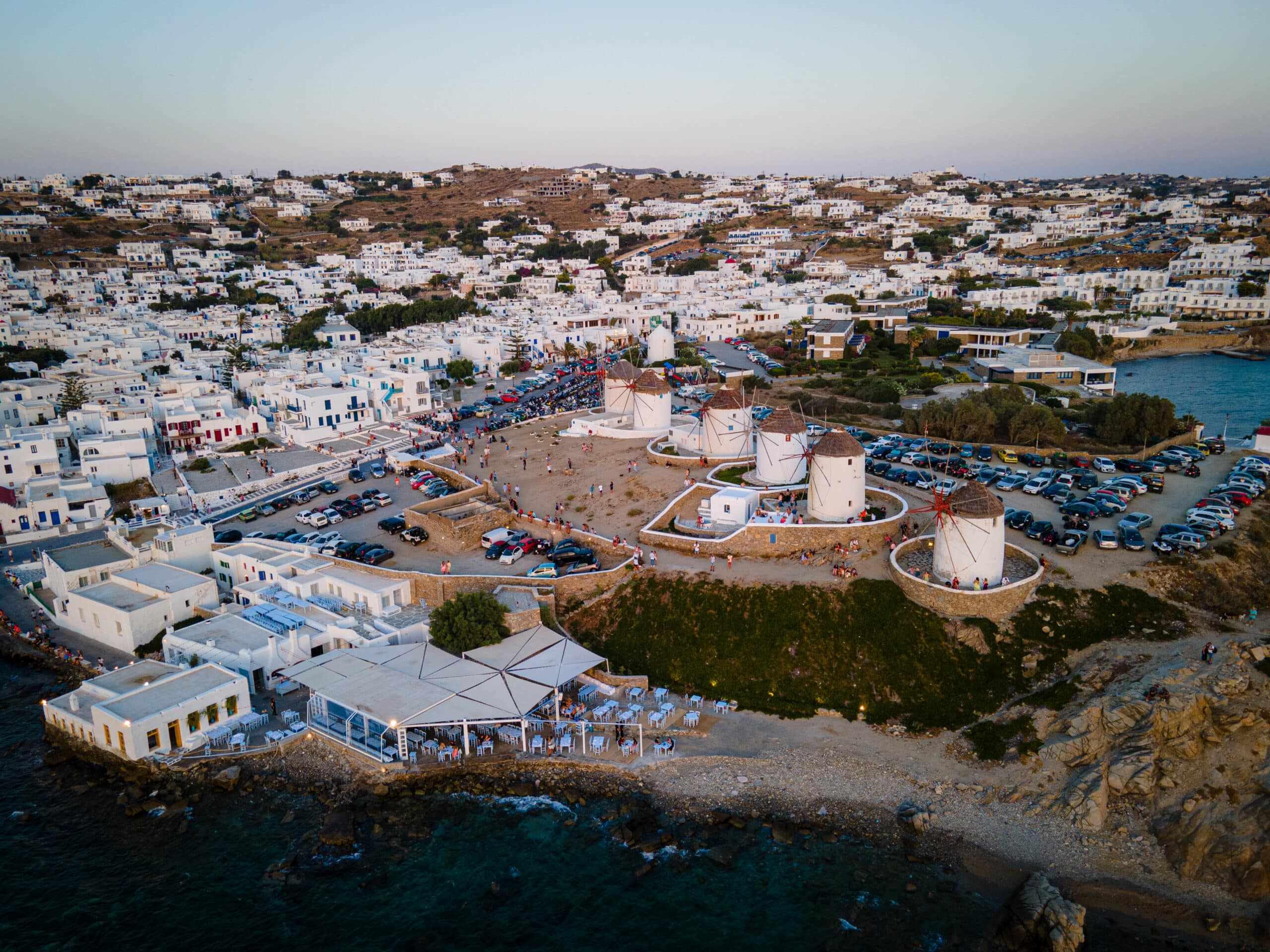aerial-sunset-view-of-mykonos-old-town-and-port-2025-09-29-17-32-55-utc