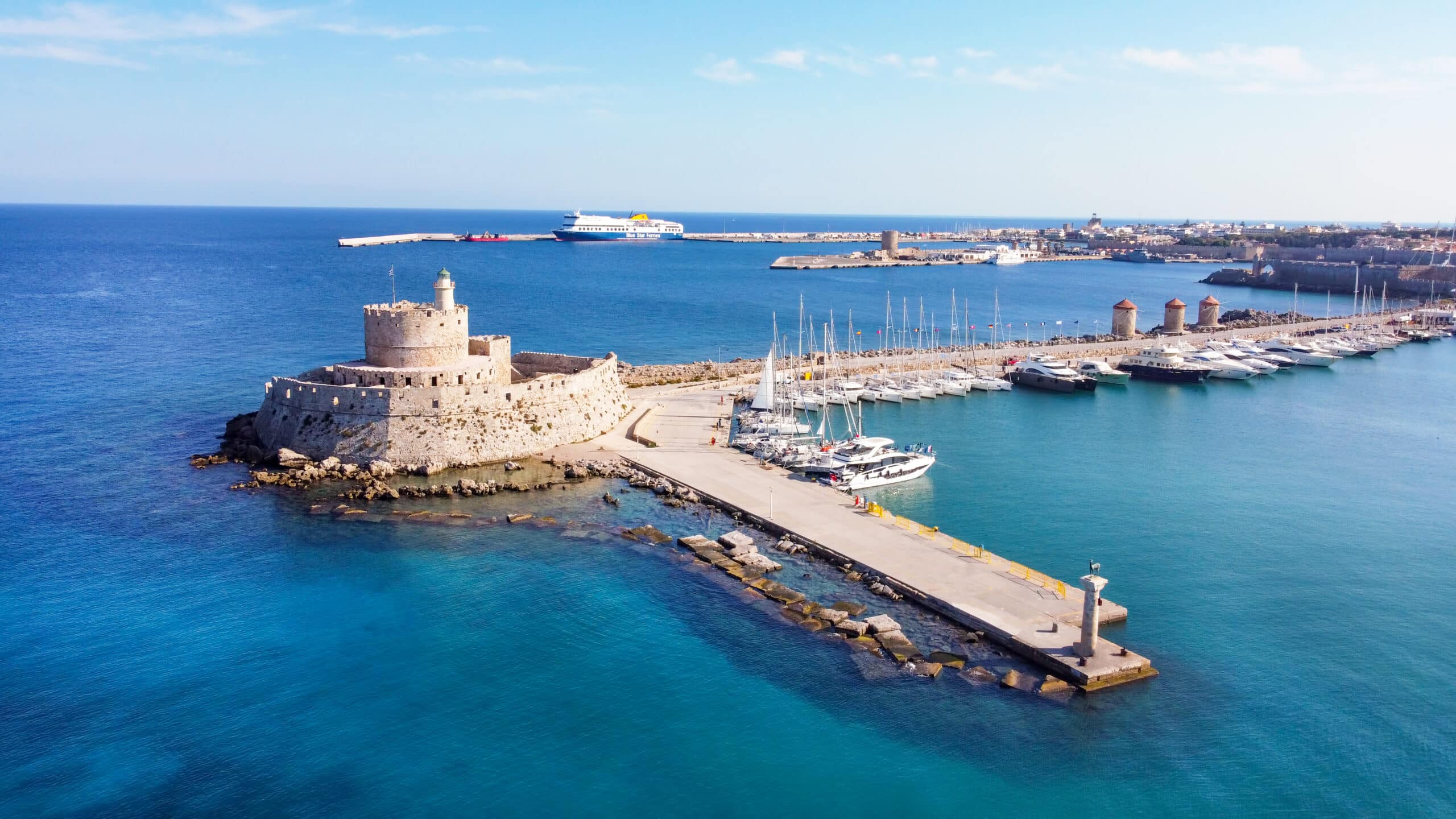 Mandraki port of Rhodes city harbor aerial panoramic view in Rhodes island in Greece